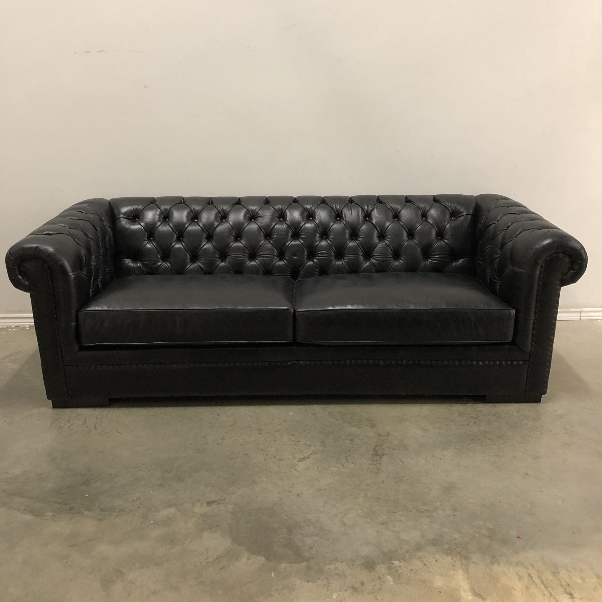 KENNEDY TUFTED LEATHER SOFA