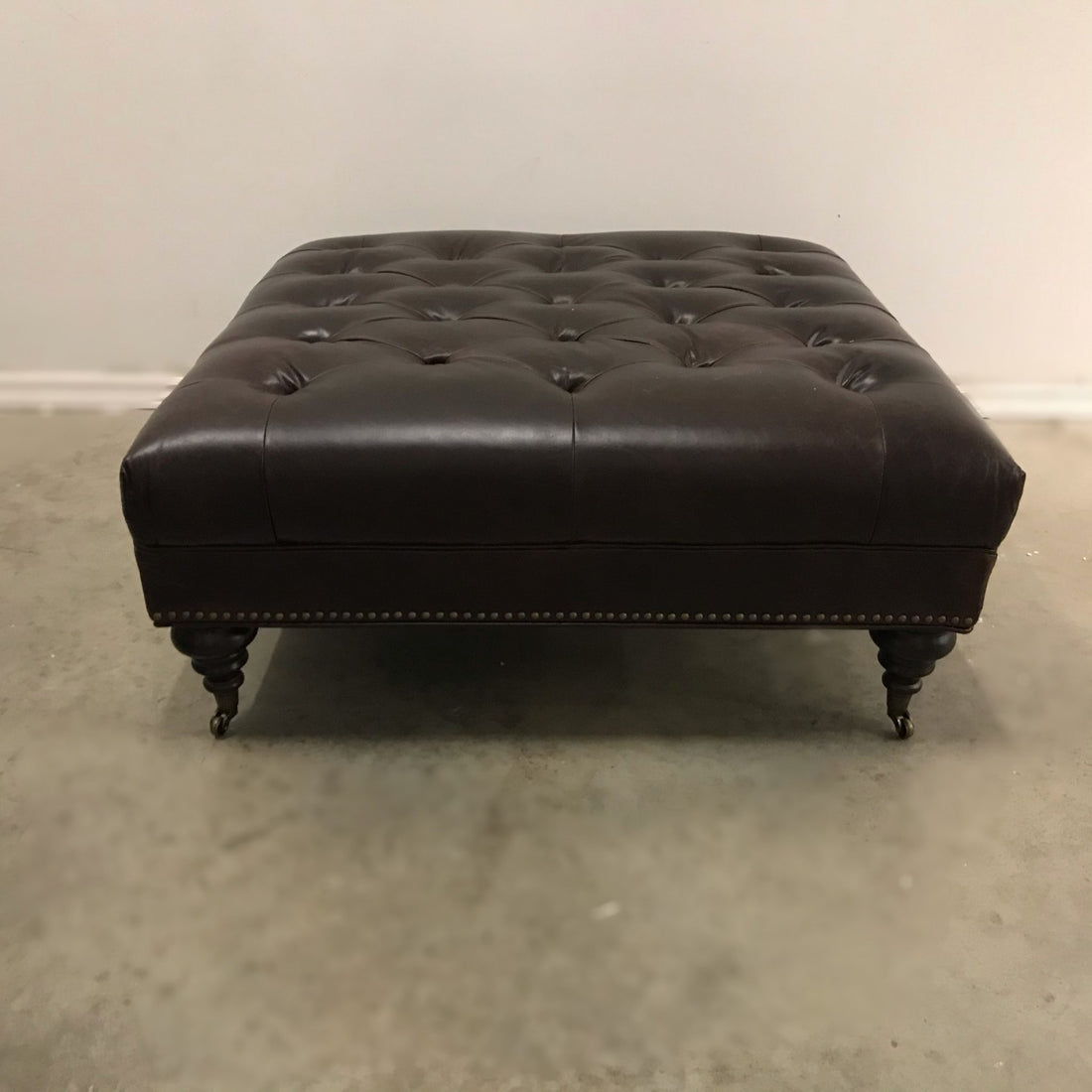 KENMOUNT TUFTED LEATHER OTTOMAN