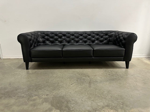 LABIRINTO TUFTED LEATHER SOFA